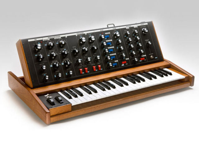 A 44-key keyboard with vinatge hardwood case